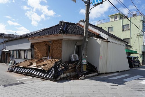 写真11　一本杉通りに建っていた解体前の歴史的建造物